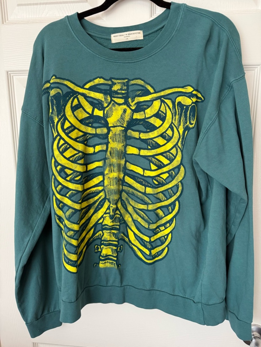 Project Social from UO Teal Sweatshirt with Yellow Skeleton Graphic